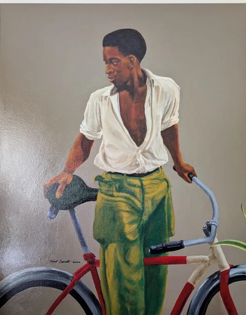 Acrylic portrait of a young man in a white shirt and green trousers standing beside a red bicycle against a warm grey ground.