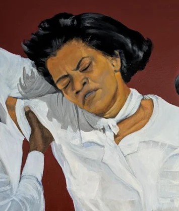 Detail of the central figure's face and expression.